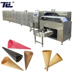 Macchina per la produzione di coni per cialde completamente automatica